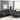 Milano gray leather power reclining sectional. Features 2 power recliners with adjustable headrest.