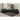 Black Sedona Sofa and Loveseat. is a stationary set upholstered in bonded leather with button tufted backs and seat cushions, track arms, and tapered block feet.