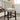 Izzy Counter Height Chair in Antique Black/Beige. Features button tufted, scrolled back, antique black legs.