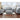 Grey Sofa and Loveseat. Box-style seat cushions with multiple contrasting accent pillows.